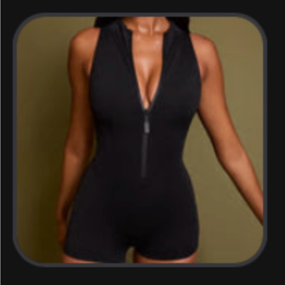 Sleeveless Surfy Shortie -
 Black Zip-Up One Piece Swimsuit